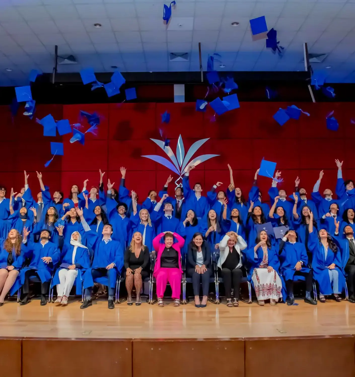 BISR Al Hamra students pose for a group photograph at their graduation.