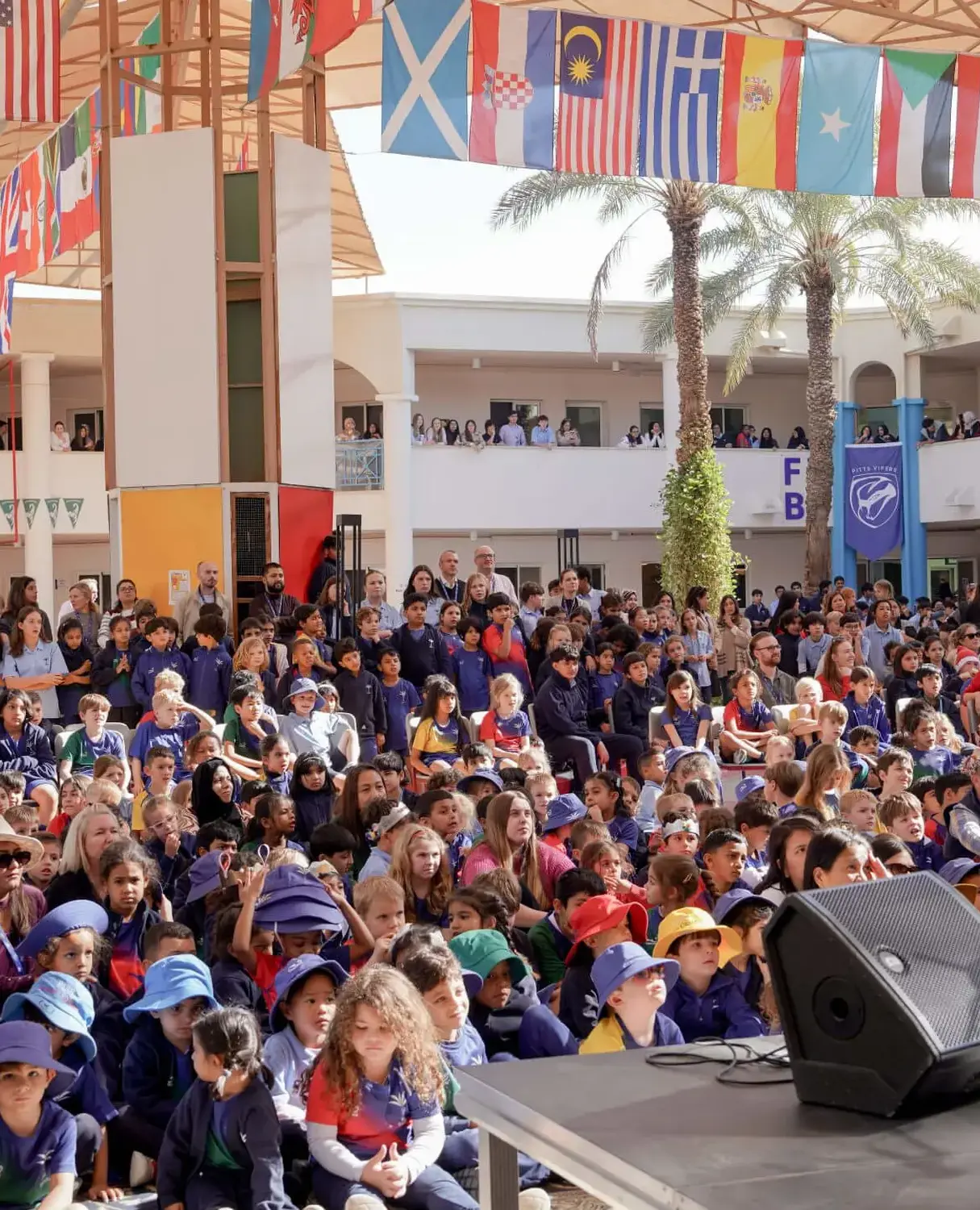BISR Al Hamra students gathered in the courtyard for a school assembly.