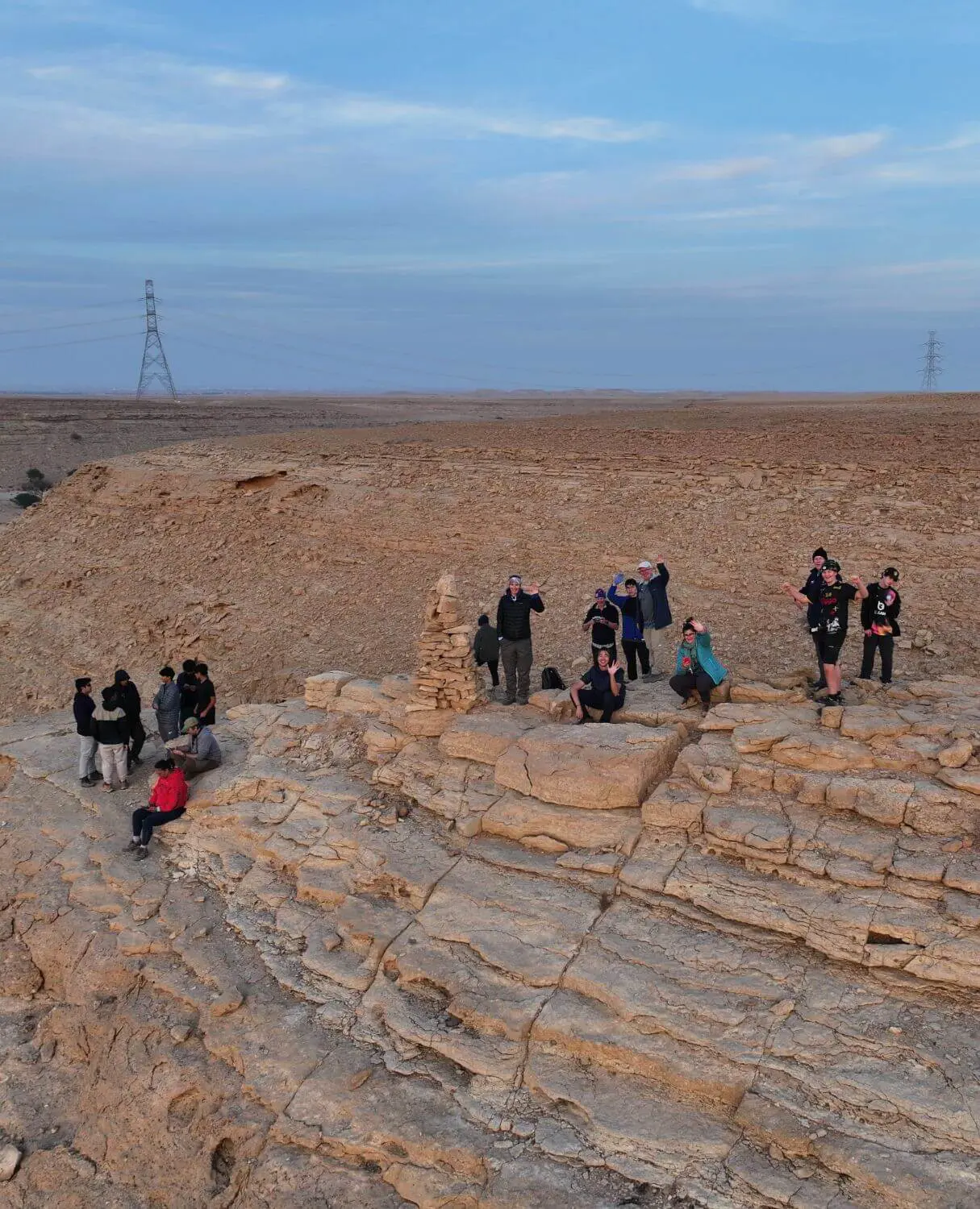 BISR students stand on a cliffside during their D of E expedition.