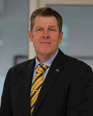 Portrait of Neil Smith, Founding Head of BISR, a private school in Riyadh